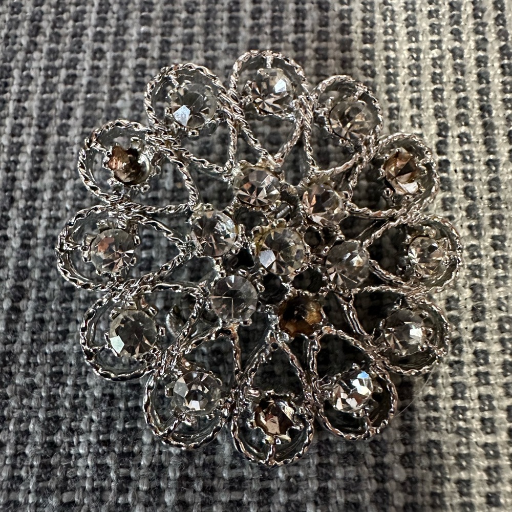 Intricate Silver Filigree Brooch with Rhinestones